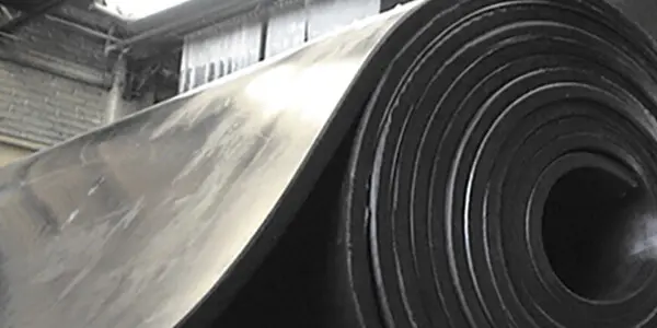 Hule Armorite o Faldón – protección contra impacto y abrasión Rollos de Hule Faldón o Armorite para minería e industria pesada